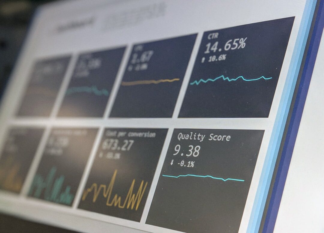 Data analytics dashboard with colorful charts and graphs on multiple monitors