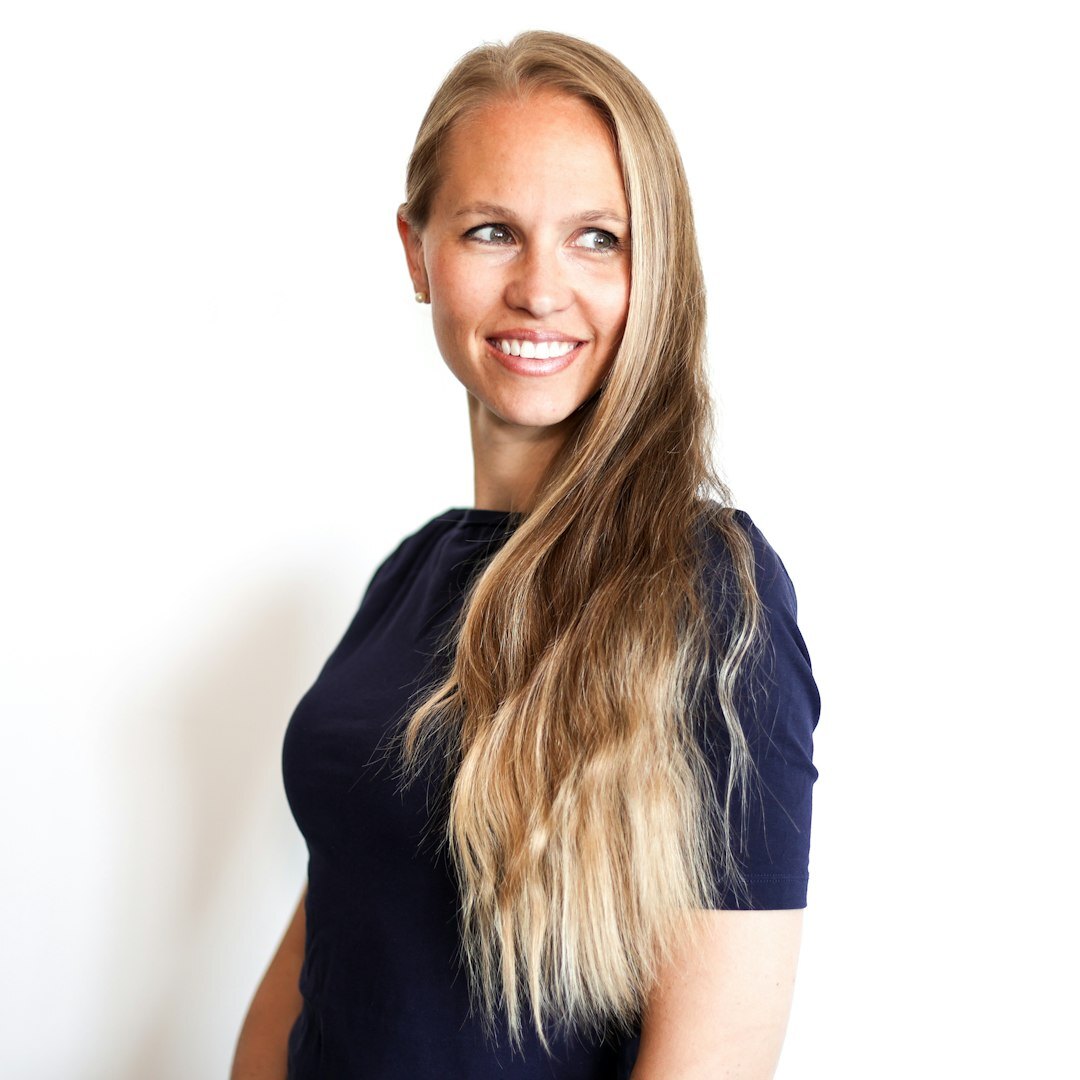 Professional portrait of young woman technology expert in business casual